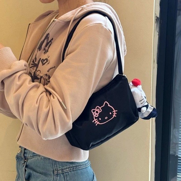 다나에 여성 헬로키티 자수 프린트 블랙 손가방 핸드백 숄더백 가방지아싱트레이드 머리끈